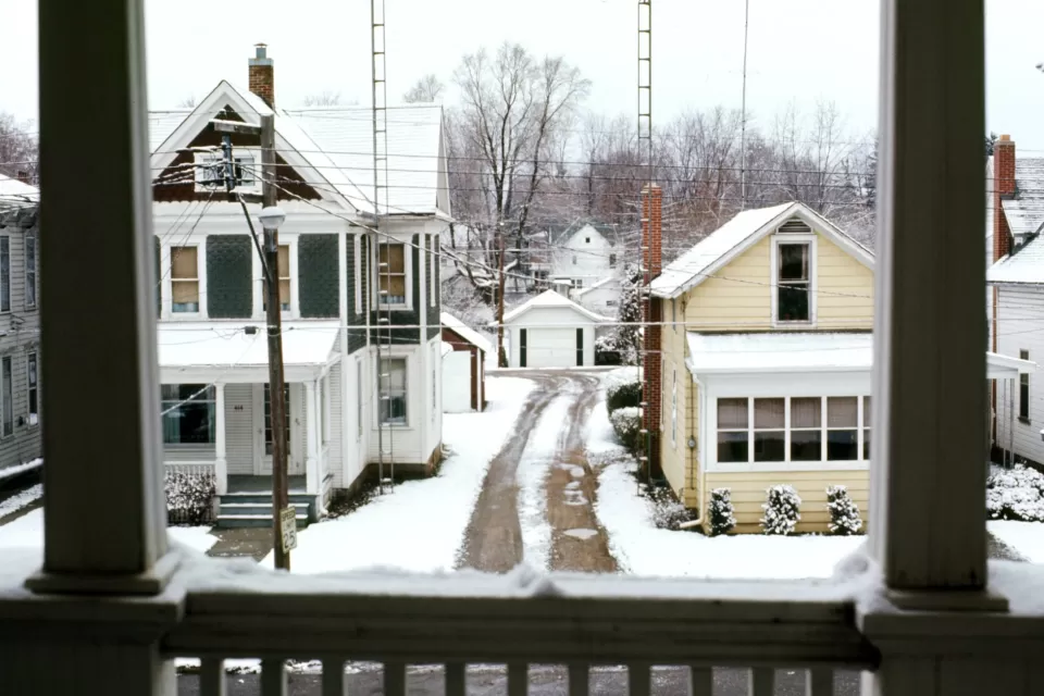 Wooden houses covered with snow